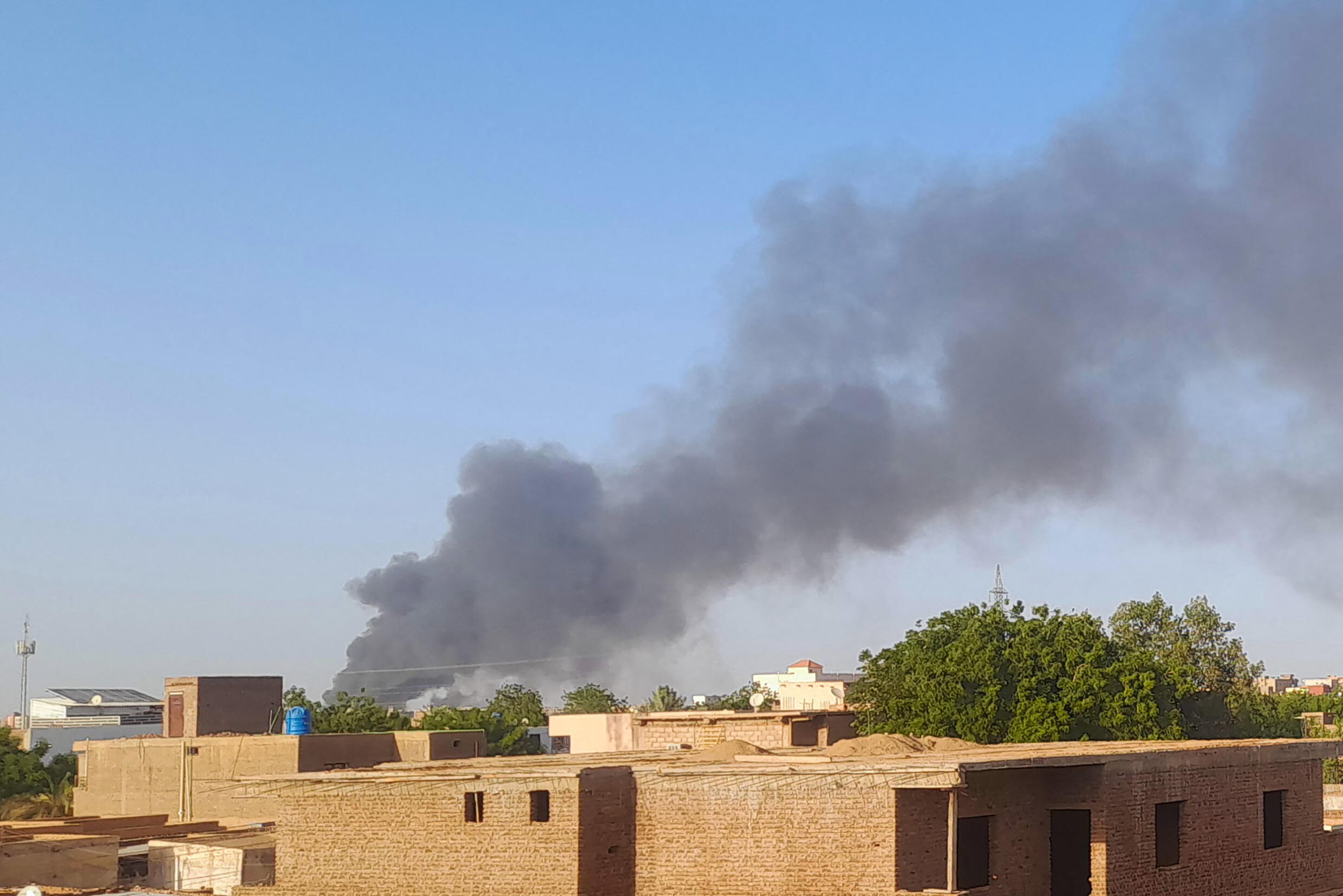 On July 14, 2023, around the Bahri district of Khartoum, smoke is seen amid fighting.