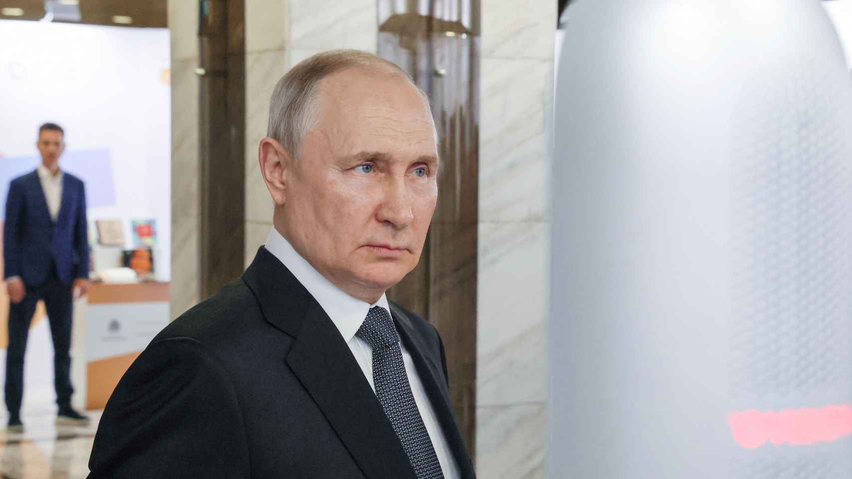 Russian President Vladimir Putin attends a forum in Moscow on Thursday.