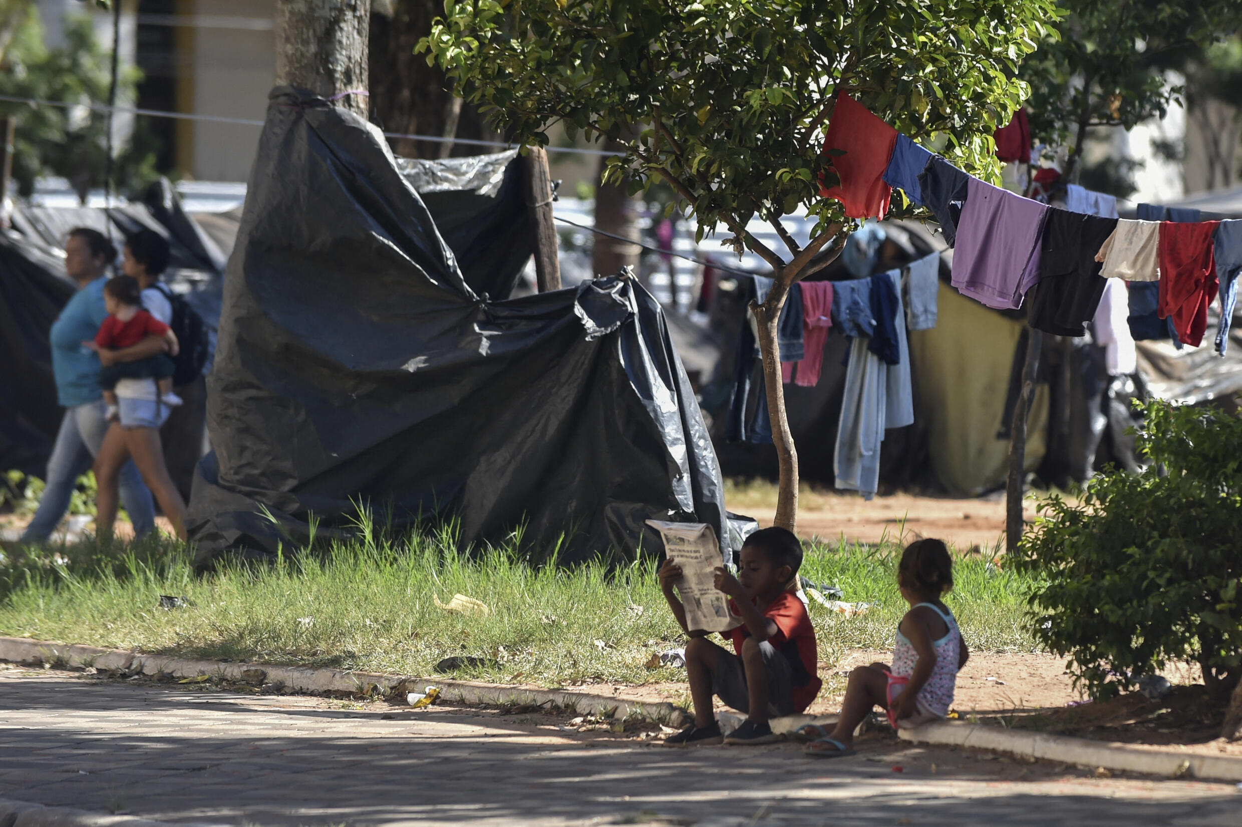 Archive - Paraguayan indigenous people camp in the main square of Asunción in front of the National Congress, on April 16, 2018. Poverty and inequality are among the main challenges of the next government in Paraguay, which holds general elections on April 30, 2023.