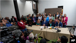 Bernardo Arévalo and his running mate Karin Herrera, the presidential ticket of the Movimiento Semilla party, hold a press conference in Guatemala City, on July 13, 2023.