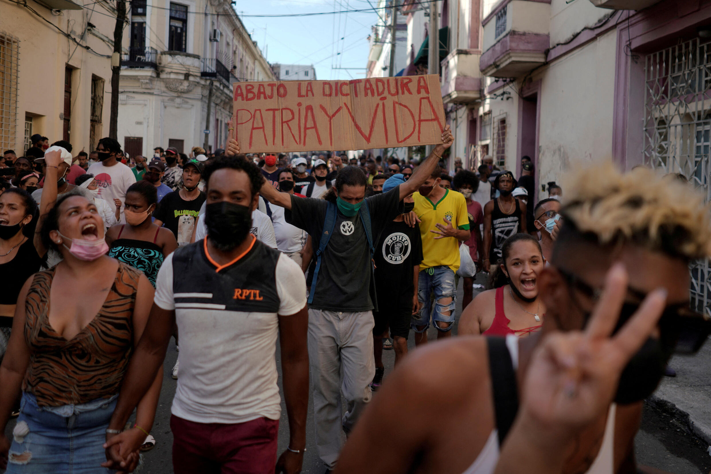 A group of Cubans shout anti-government slogans during a protest in Havana, Cuba, on July 11, 2021.