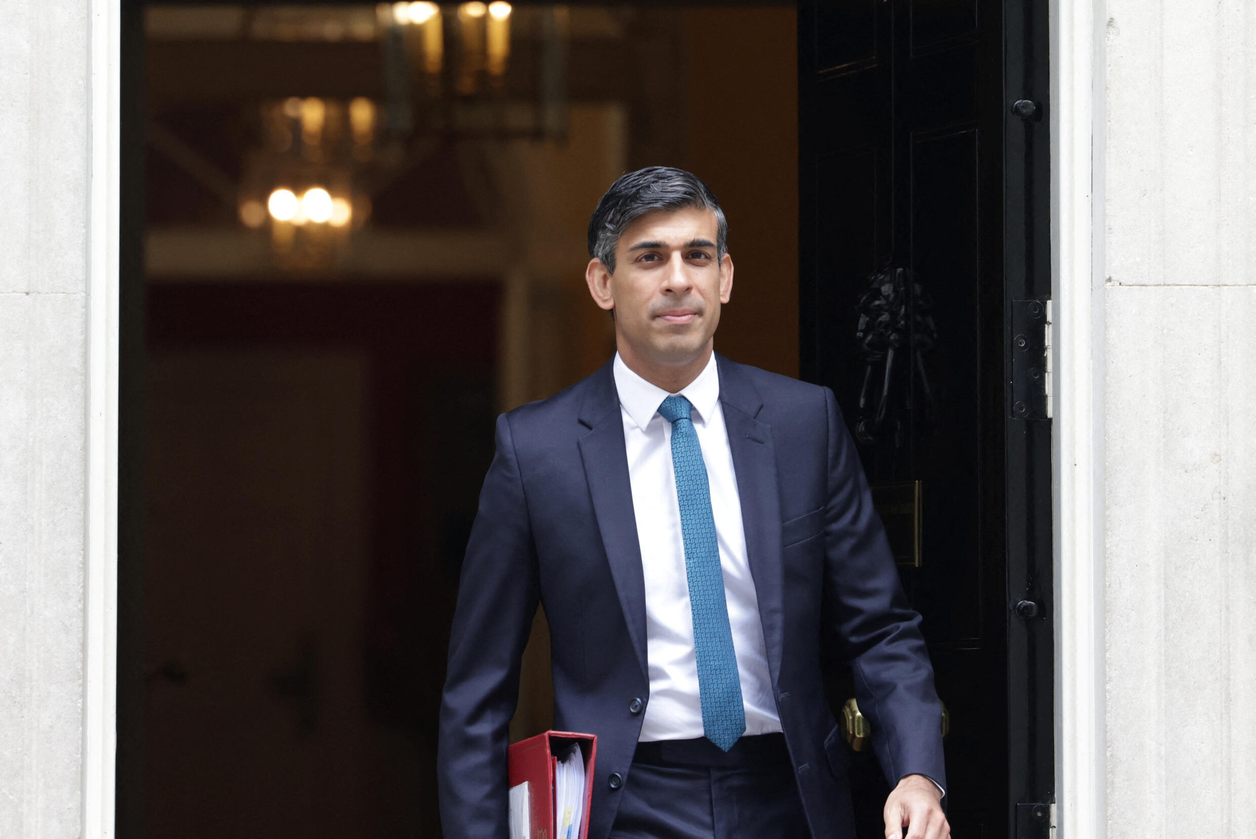 British Prime Minister Rishi Sunak walks outside 10 Downing Street in London, Britain, on July 19, 2023.