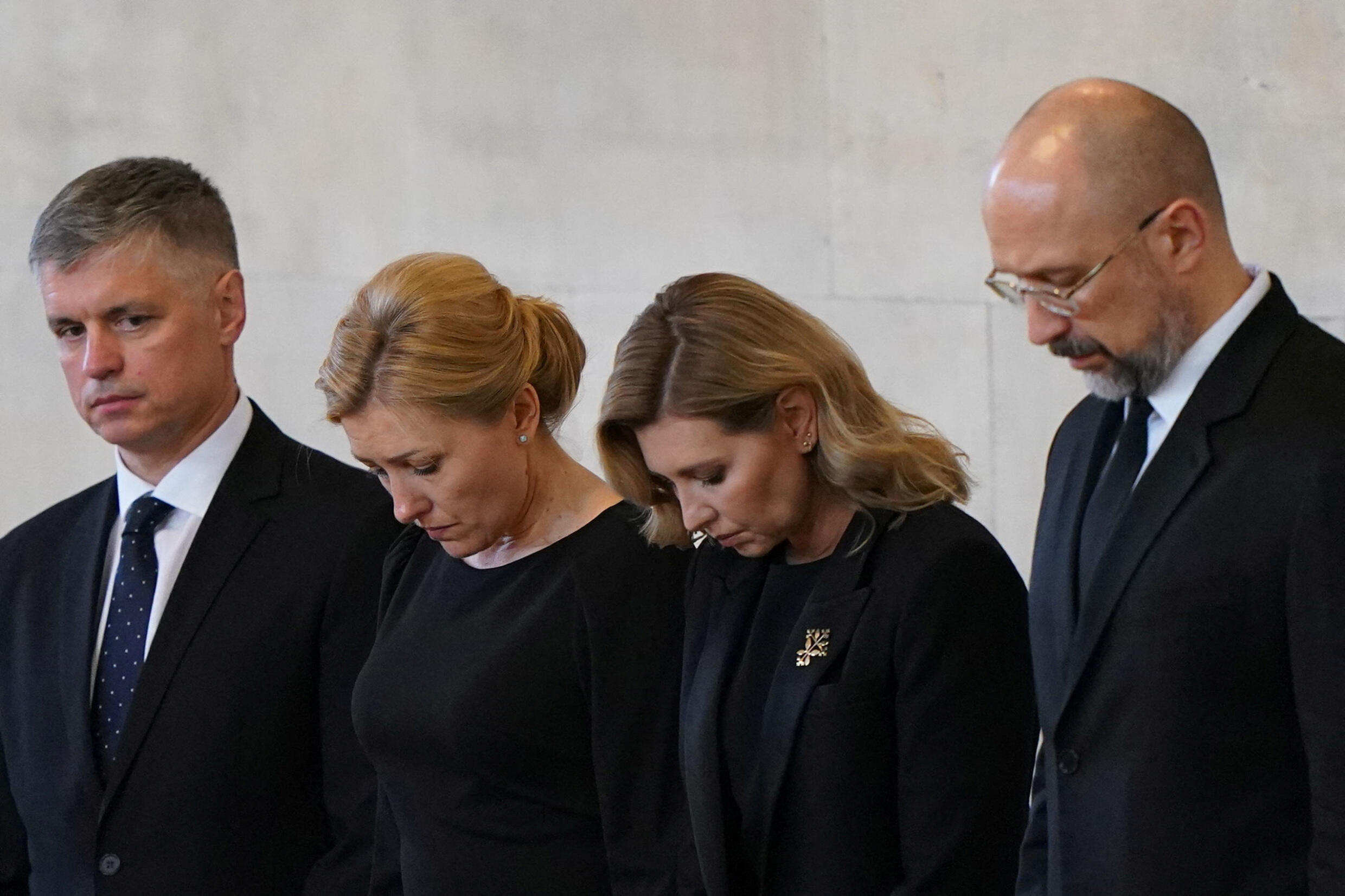 Archive.  Ukraine's Ambassador to the UK Vadym Prystaiko (left) and Ukraine's First Lady Olena Zelenska (2nd right) view the coffin of Queen Elizabeth II at the Palace of Westminster, London.