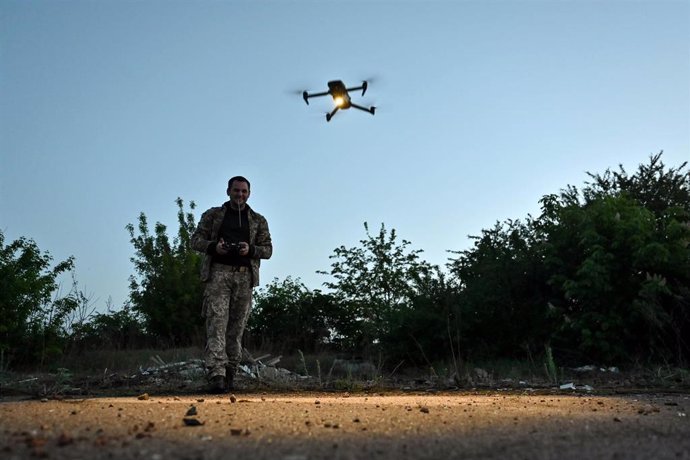 A Ukrainian soldier operating a drone