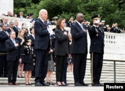 President Joe Biden, Vice President Kamala Harris, Secretary of Defense Lloyd Austin and Commanding General of the Army Maj. Gen. Trevor J. Bredenkamp attend a Memorial Day ceremony at Arlington National Cemetery, May 27 of 2024.