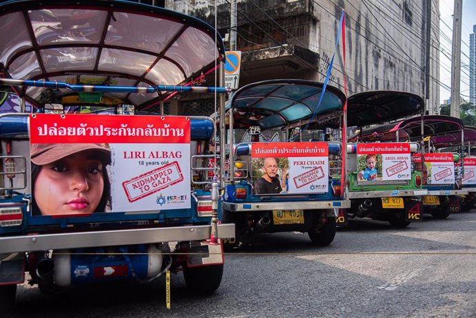 File - January 12, 2024, Bangkok, Thailand: Portraits of people who were kidnapped to Gaza with a Thai message that says ''Free Hostages to Home Now'' are seen hanging on the auto-rickshaws during a campaign ''Bring Them Home Now'' at the Embassy of I