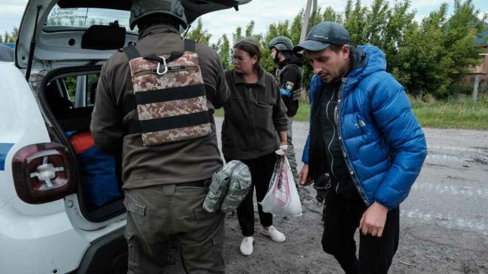 A family from Vovchansk flees the city in the face of the Russian advance and continuous artillery attacks.