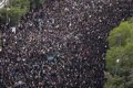 Tens of thousands of people take part in funeral ceremonies before Raisi's burial in Mashhad