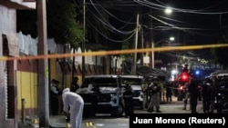 A forensic technician works at the scene where Celaya mayoral candidate Bertha Gisela Gaytán was murdered by unknown assailants during a campaign rally, in San Miguel Octopan, Guanajuato state, Mexico, on April 1, 2024.