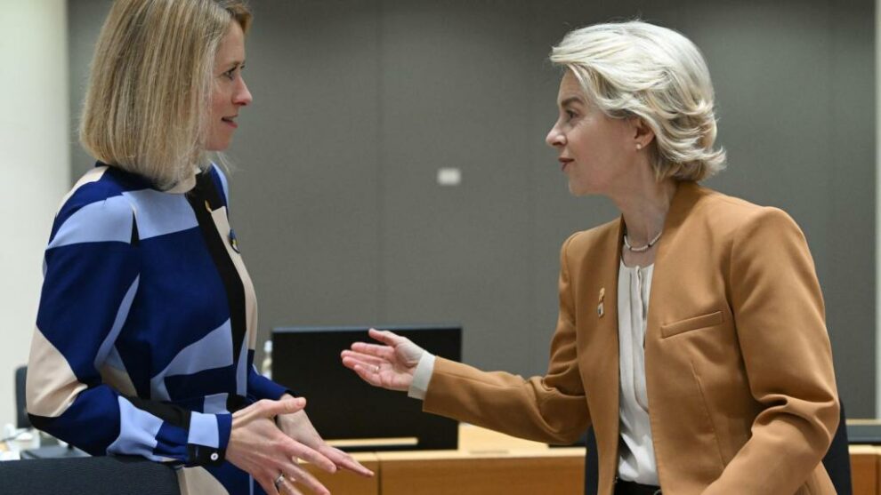 Estonian Prime Minister Kaja Kallas talks with President Ursula von der Leyen during a European Council