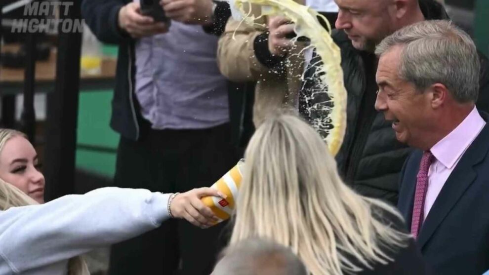 A milkshake is thrown in the face of populist Nigel Farage at his first campaign event in the United Kingdom