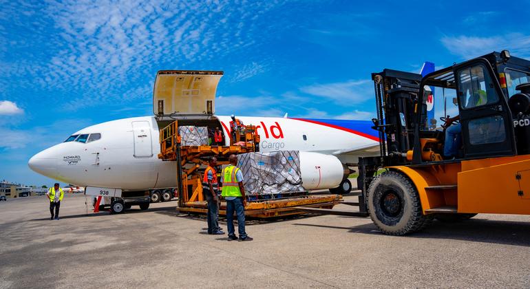 A WFP-chartered cargo plane is unloaded of its 15 tons of desperately needed medical supplies at Toussaint Louverture International Airport in Port-au-Prince, Haiti.