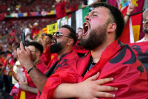 Albanian fans chant during the match against Croatia.