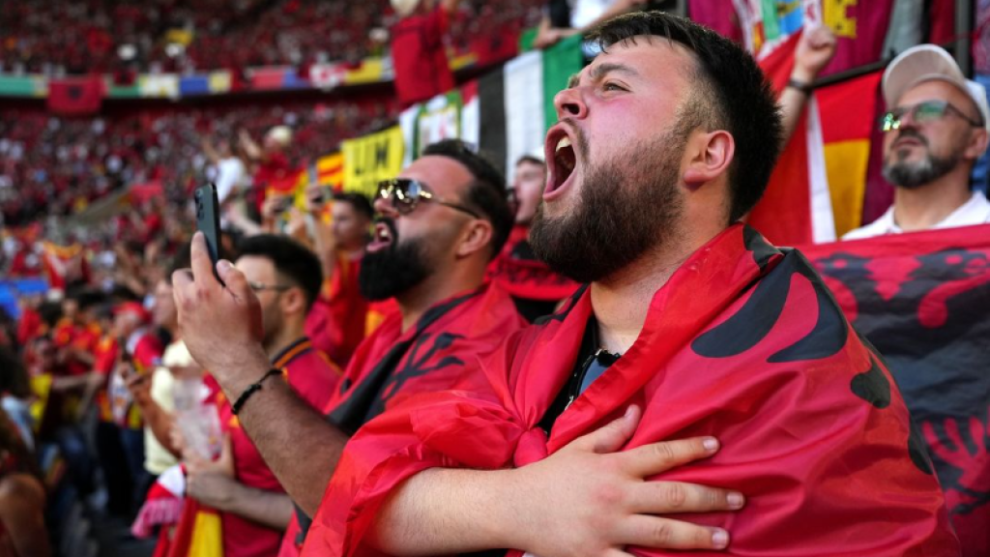 Albanian fans chant during the match against Croatia.