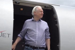 Julian Assange stops in Bangkok on the way to US court to be released