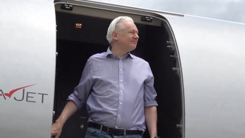 Julian Assange stops in Bangkok on the way to US court to be released