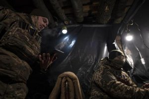 The control room of a Ukrainian drone unit, installed inside a trench on the Bakhmut combat front.