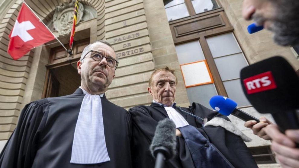 Lawyers for the accused, Nicolas Jeandin (left) and Robert Assael (right), leave the court after a break in the reading of the verdict, during the trial against members of the Hindu billionaire Hinduja family.