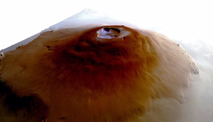 Perspective view of Mount Olympus from the Mars Express probe, with frost (blue) in the cauldron-shaped hole