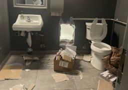 They cut a hole in the bathroom of a coffee shop... to steal 436 iPhones from the adjacent Apple store