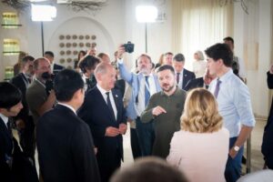 Zelensky with G7 leaders at the Italian summit.