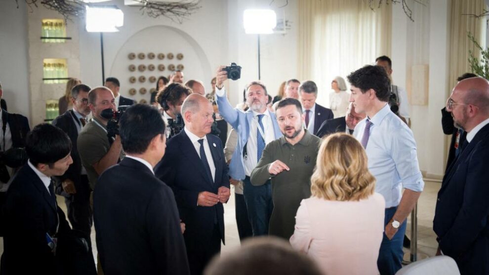 Zelensky with G7 leaders at the Italian summit.