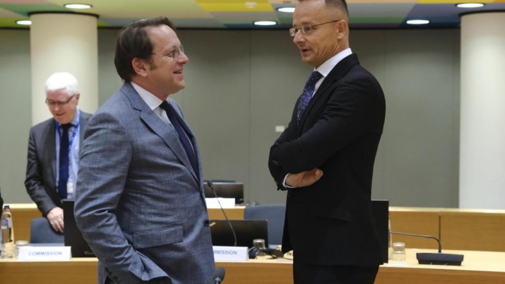 Hungarian Foreign Minister Péter Szijjártó talks with Hungarian Enlargement Commissioner Olivér Várhelyi during their meeting in Brussels on Monday