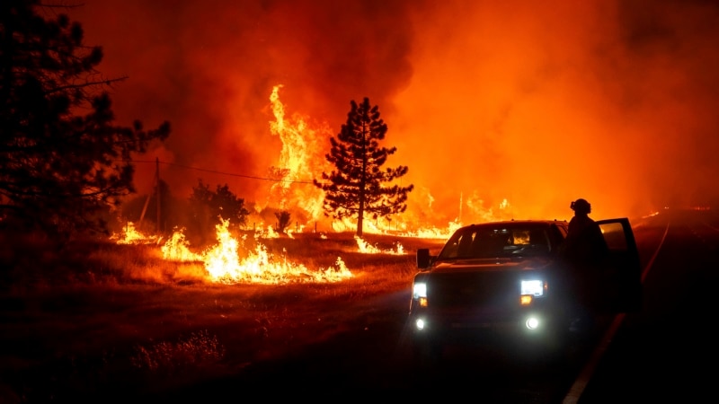 Firefighters battle massive California wildfire in cooler weather