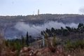 Hezbollah fires dozens of Katyusha rockets at two kibbutzim in northern Israel