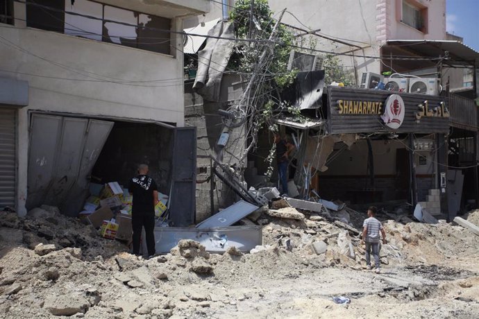 Damaged buildings in the West Bank town of Tulkarem