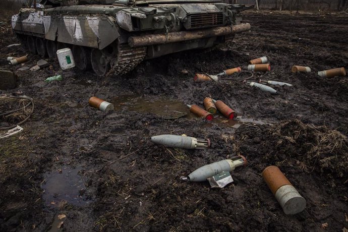 File - April 2, 2022, Trostyanets, Sumy, Ukraine: Ammunition for a Russian tank litters the ground on a field between Okhtyrka and Trostyanets, Ukraine on April 2, 2022. The roadway had been littered with multiple Russian tanks and various vehicles eith