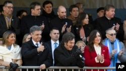 Argentine President Javier Milei and his Vice President Victoria Villarruel attend a military parade marking Independence Day in Buenos Aires, Argentina, Tuesday, July 9, 2024.