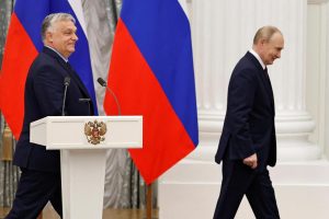 Hungarian Prime Minister Viktor Orban follows Russian President Vladimir Putin.