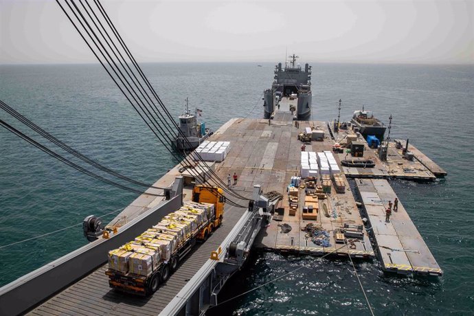 File - A truck at the temporary dock set up by the United States to supply aid to Gaza