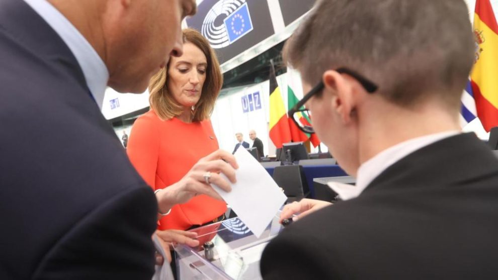 European Parliament President Roberta Metsola casts her vote for Von der Leyen