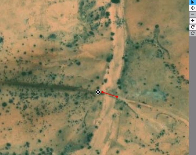 This image is an example of the task that volunteers are doing: finding the junctions and marking the length of the path that runs through a wadi. The Zooniverse interface is what allows the images to be marked.