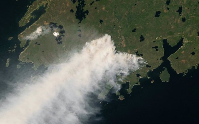 An astronaut aboard the International Space Station photographed smoke from the Nova Scotia wildfires rising over the Atlantic Ocean in May 2023.