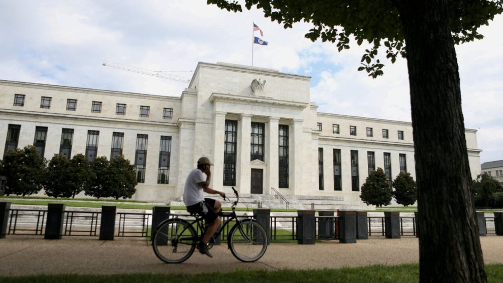 Fed holds rates, points to possible cut in September