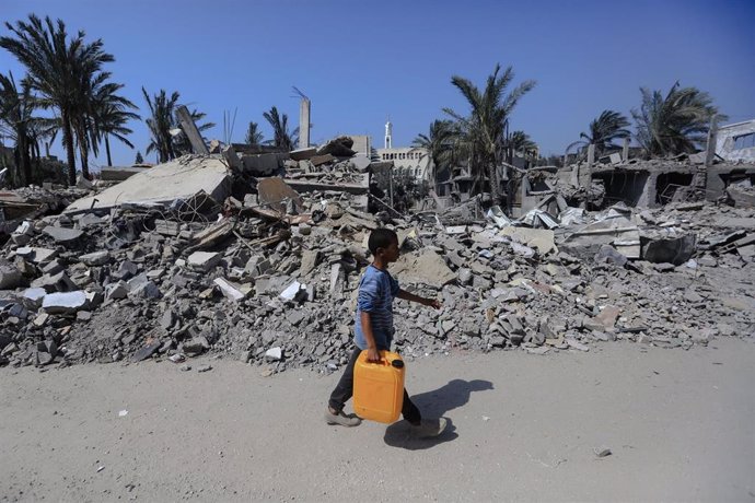 File - A Palestinian in Der el-Bala, in the central Gaza Strip