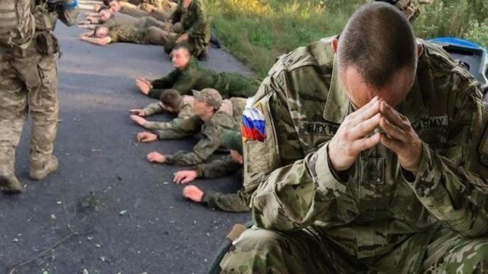 Screenshot from a video released by Ukrainian forces showing several Russian soldiers surrendering in the Kursk region.