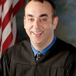 District Judge Kevin R. Mullins