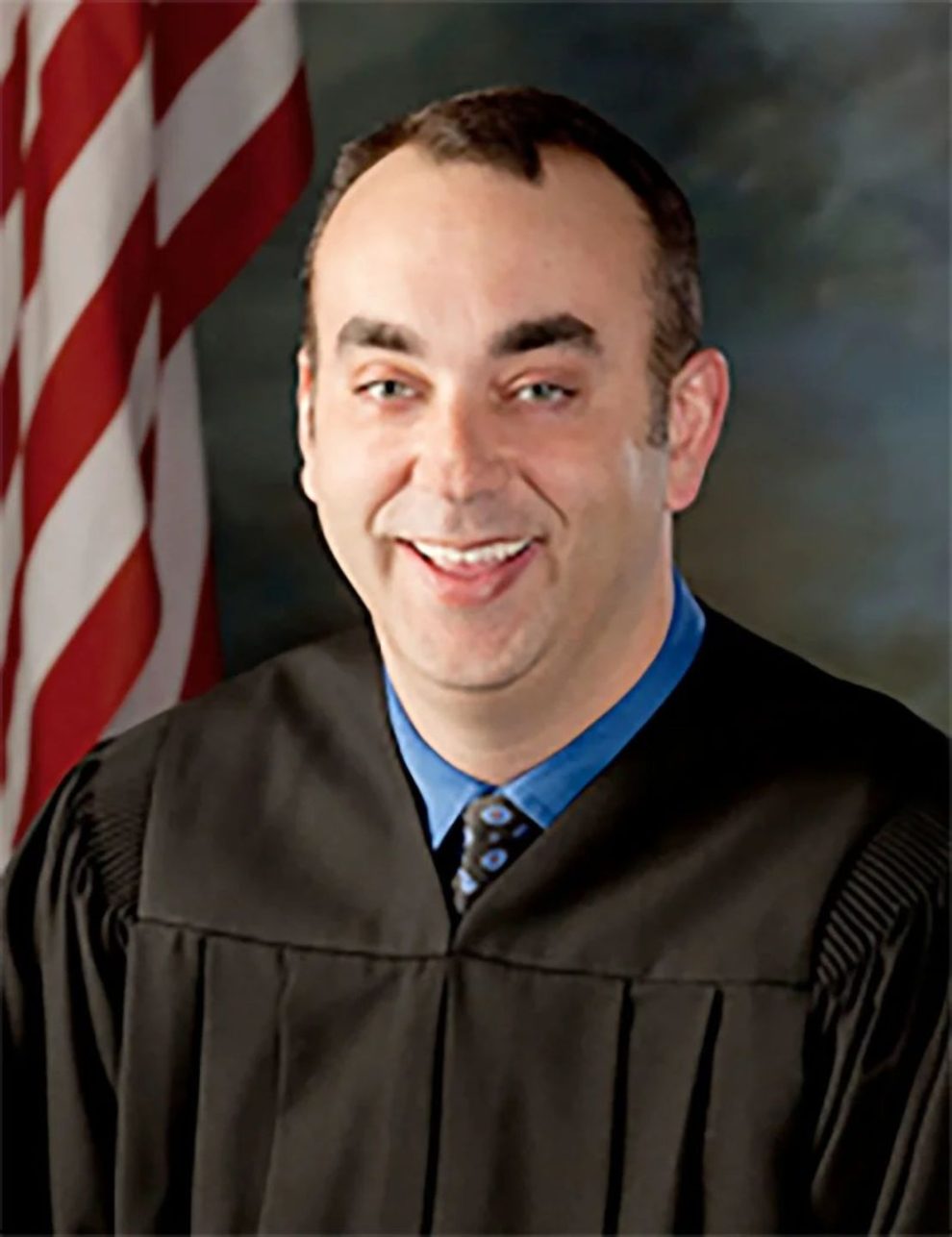 District Judge Kevin R. Mullins