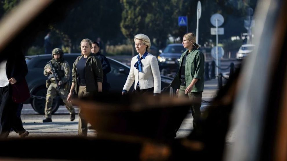 European Commission President Ursula von der Leyen, center, on her way to visit a memorial wall commemorating fallen Ukrainian soldiers in the war with Russia, in kyiv, Sept. 20. Christoph Soeder/AP