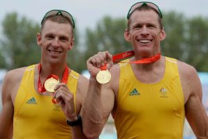 Australians Drew Ginn (left) and Duncan Free display their gold medals in the men's pair rowing at the Beijing 2008 Olympic Games on August 16, 2008.