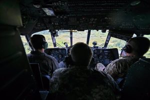 File - Ukrainian soldiers on board a plane