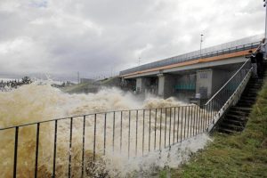 Rising water level in the Nysa Klodzka River at the Glebinow Hydroelectric Power Plant in Nysa, Poland.