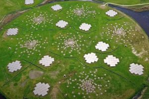 The European radio telescope LOFAR, or Low Frequency Array, allowed astronomers to detect the glow from the black hole's pair of giant jets. Credit: ASTRON