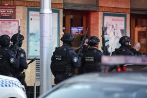 Police enter Westfield shopping center in Bondi Junction following a mass stabbing on April 13.