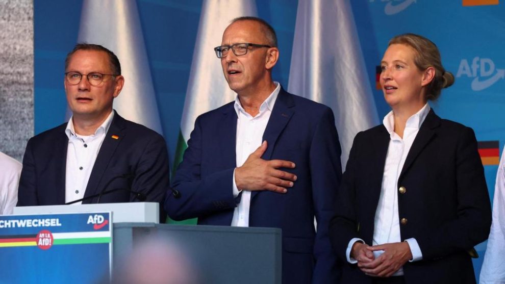 Alternative for Germany (AfD) party co-leaders Alice Weidel and Tino Chrupalla stand with Joerg Urban, AfD party top candidate for the Saxony state elections, during a campaign event for the Saxony regional elections in Dresden, Germany, August 29, 2024.