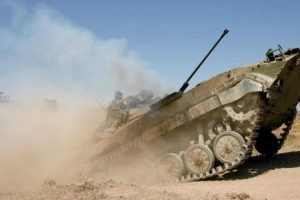 A Russian soldier maneuvers a tank in this file image.